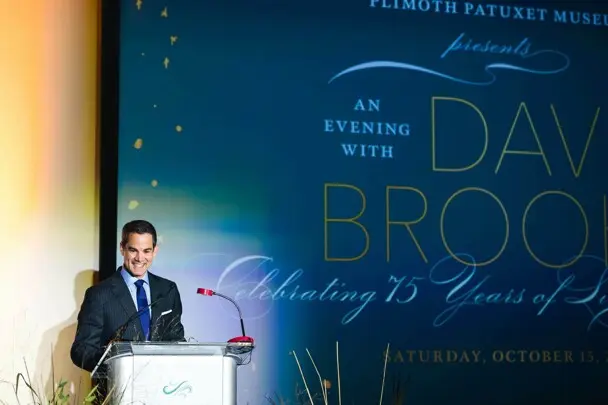 Jared Bowen of GBH standing at podium.