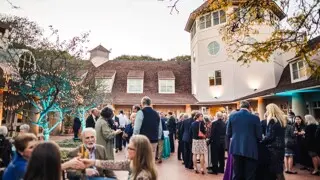 Museum members enjoy a part in the Museum's Courtyard.