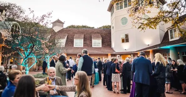 Museum members enjoy a part in the Museum's Courtyard.