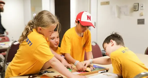 Children work together to solve a history based activity.