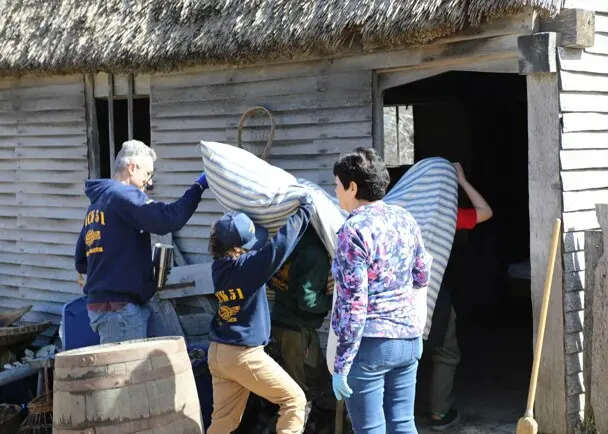 Volunteers village house clean up day