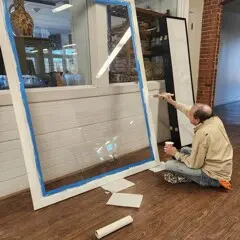 Volunteer trustee painting clean up day