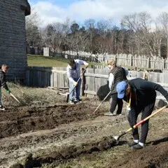 Volutneers garden village clean up day
