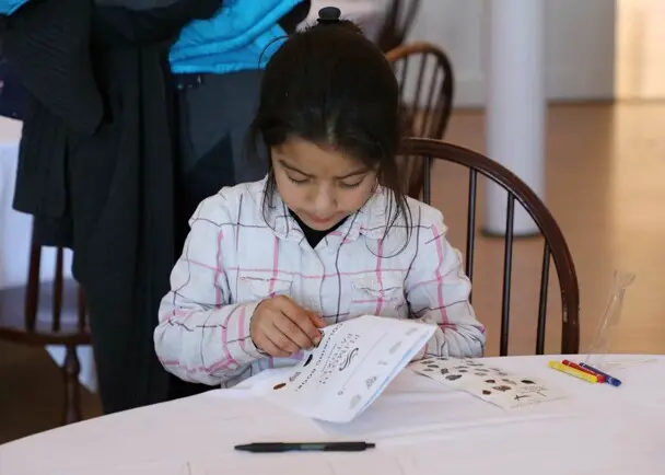 Young volunteer lunch coloring clean up day