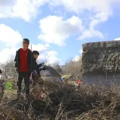 Young volunteers village clean up day