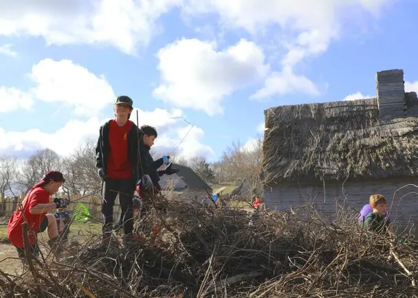 Young volunteers village clean up day