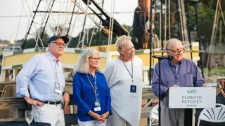 Plimoth Patuxet Trustees deliver an address on the pier before Mayflower II.