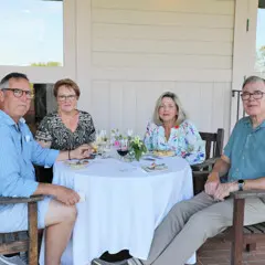 Guests patio reception evening program table