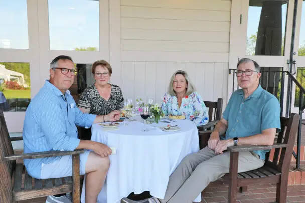 Guests patio reception evening program table