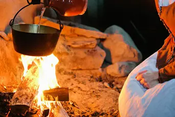 Hearth pilgrim woman pouring water