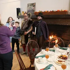Thanksgiving dining family fireplace picture