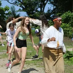 Guests and Educators take part in a traditional Wampanoag dance on the Homesite.