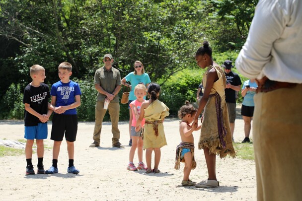 Children participate in Wampanoag dance on the Historic Patuxet Homesite