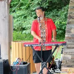 Summer music series the groovalottos center pavilion keyboard player