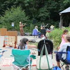 Summer music series kim moberg performing crowd