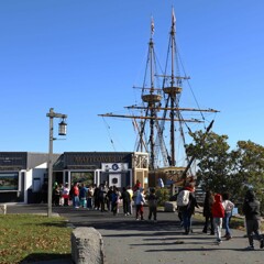 Students line up at the blue entrance building of Mayflower II.