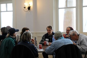 Volunteers enjoy lunch museum clean up day