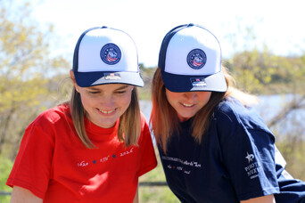 Revolutionary ideas started here trucker hats and red and blue tee shirts