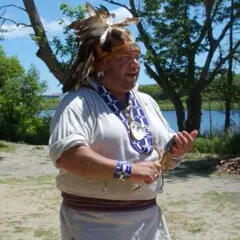 Culture keepers dressed in reglia sings
