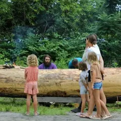 Guests stop to speak with Educators conducting the mishoon burn