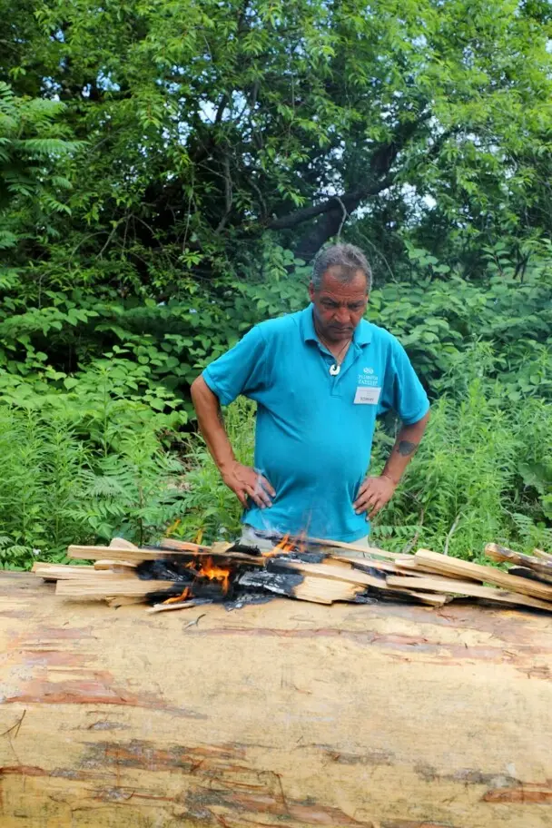 Museum educator watching first burn