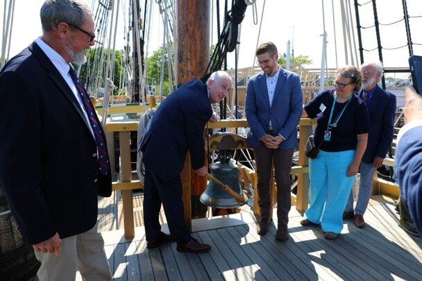 Sir Lindsay Hoyle ring the Mayflower Bell on the top deck of Mayflower II