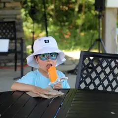 Young boy east ice cream treat