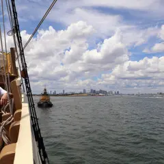 Mayflower tug boat boston harbor city skyline