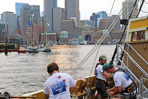 Sail boston 2026 sunset sail boston crew working lines city skyline