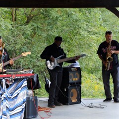 The GroovaLottos perform live music.