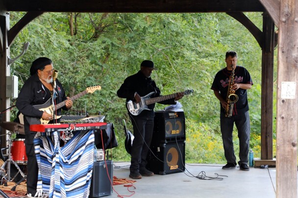 The GroovaLottos perform live music.