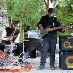 The GroovaLottos guitarist and drummer perform