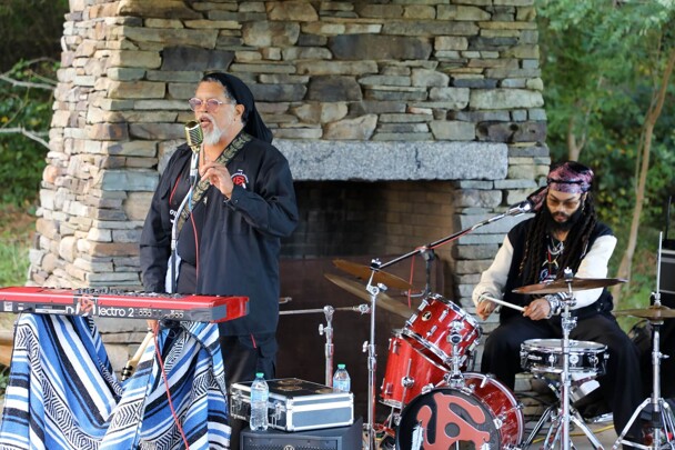 Lead singer of The GroovaLottos performs