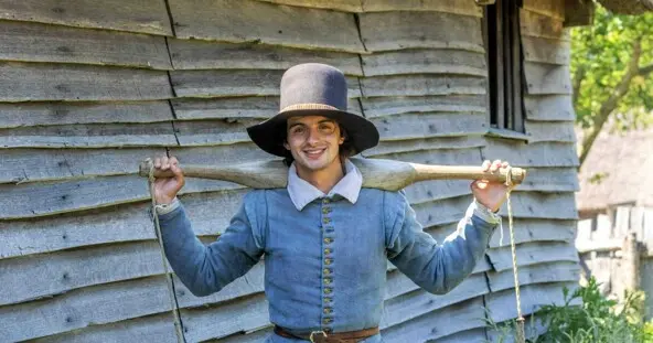 Pilgrim Man carrying water