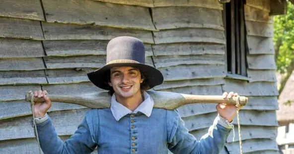 Pilgrim Man carrying water