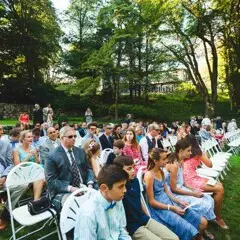 wedding guests in a garden setting