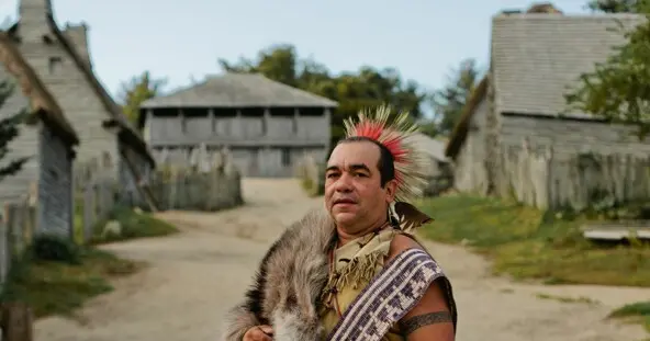 Ousamequin stands prominently in Plymouth Colony