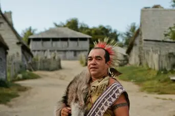 Ousamequin stands prominently in Plymouth Colony