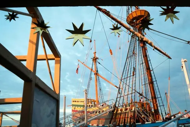 Mayflower II from exhibit dock with event decor.