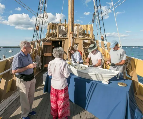 Guests enjoy decks of Mayflower II and raw bar.